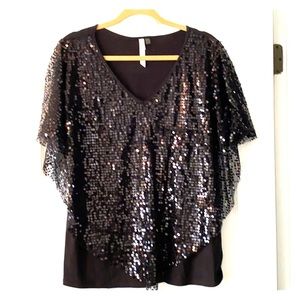 Black sequined top.